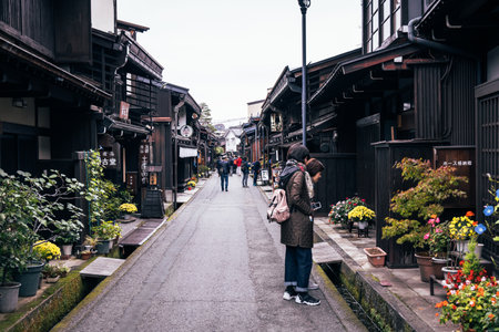 Takayama, Japan - October 21,  2019 : Tourists visiting the Old City of Takayama, Japan