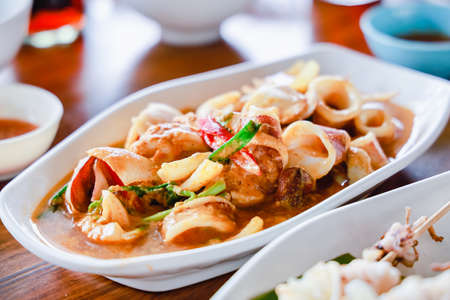 Stir Fried Squid with Curry Powderの写真素材