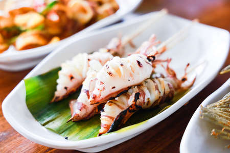 Grilled Squid  at Thai restaurant.の写真素材