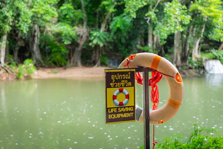 Life presever on the coast with the river in the background. Life saving equipment.の写真素材