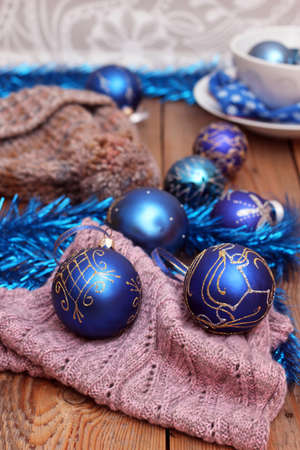 Christmas decorations with balls, woolen scarf and capの写真素材