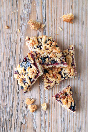 Holidays, food and drink concept. Handmade cookies on a wooden background. Top view. Selective focusの写真素材