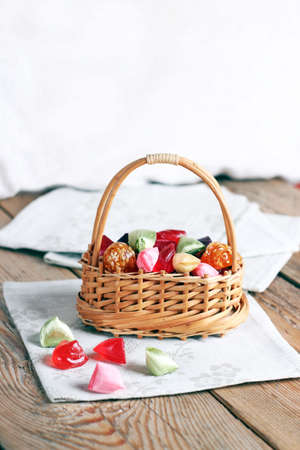 Basket with colorful sweet candies. Selective focus. Traditional candies for Seker Bayram holidayの写真素材