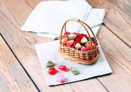 Basket with colorful sweet candies. Selective focus. Traditional candies for Seker Bayram holidayの写真素材