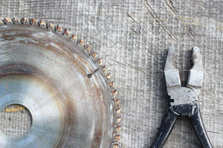 Still life concept. Tools on a rustic wooden table. Selective focus, top view
