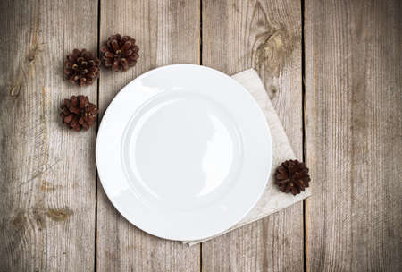 Still life, food and drink, seasonal and holidays concept. Table setting on a rustic wooden table in a autumn style. Selective focus, top view, copy spaceの写真素材