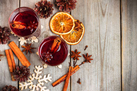 Still life, food and drink, seasonal and holidays concept. Christmas mulled wine on a rustic 
wooden table. Selective focus, copy space background, top viewの写真素材