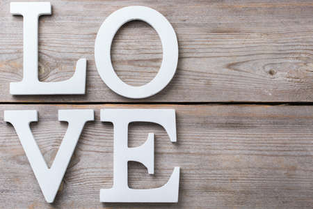 Love and still life concept. Valentines day holiday letters text message card. Top view flat lay overhead, copy space backgroundの写真素材