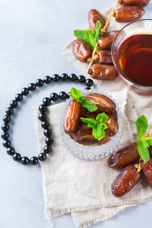 Ramadan ramazan kareem. Traditional arabic tea with mint and dates for iftar party holidaysの写真素材