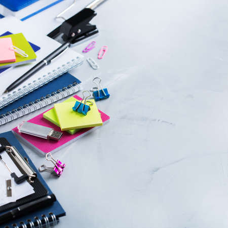 Back to school, business office education concept. Assortment of supplies, crayons, pens, notebook on a table. Copy space backgroundの写真素材