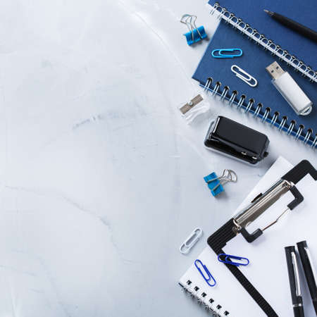 Back to school, business office education concept. Assortment of supplies, crayons, pens, notebook on a table. Copy space background, top view flat lay overheadの写真素材