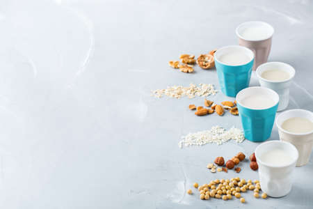 Food and drink, health care, diet and nutrition concept. Assortment of organic vegan non diary milk...