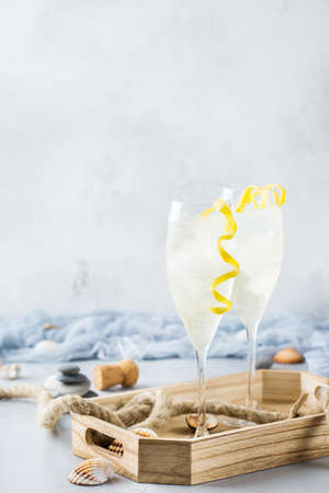 Food and drink, party holiday concept. Alcohol beverage cold cool champagne cocktail drink on a modern table for summer days. Copy space backgroundの写真素材