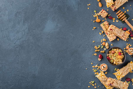Food and drink, dieting, nutrition breakfast concept. Healthy homemade cereal granola muesli bars...