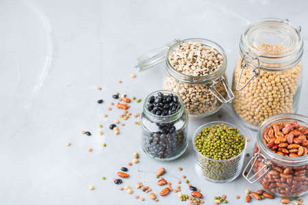Healthy food, dieting, nutrition concept, vegan protein source. Assortment of colorful legumes in...