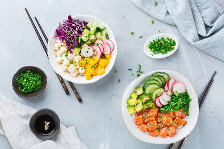 Fast and healthy food, lunch, nutrition concept. Fresh organic hawaiian salmon and tofu poke bowl...