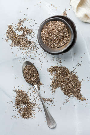 Healthy eating, dieting and nutrition, vegan concept. Organic chia seeds in a bowl, ingredient,...