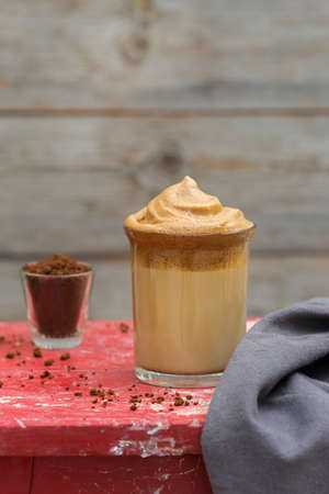 Trendy Dalgona Coffee - corean, Indian Phenti hui drink. Iced frothy whipped ultra fluffy texture. Viral social media worthy drink. の写真素材
