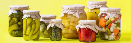 Preserved and fermented food. Assortment of homemade jars with variety of pickled and marinated...