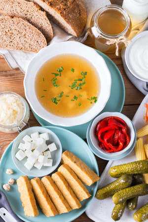Postbiotics - metabolites and cell-wall components from probiotics, functional food. Tempeh, kombucha, sauerkraut, pickles, kefir, yogurt, miso soup, soft cheese, sourdough breadの写真素材