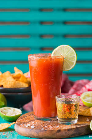 Mexican alcohol cocktail Chavela served with tequila shotの写真素材