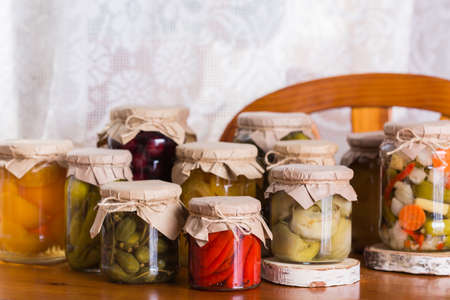 Homemade preserved, fermented food, pickled, marinated vegetables, fruit compoteの写真素材