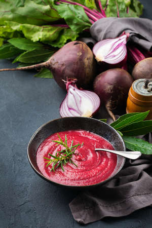 Seasonal fall autumn creamy beetroot soup on a tableの写真素材