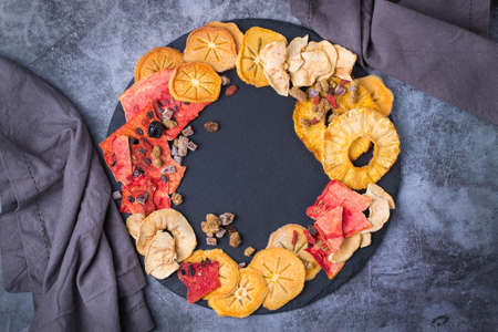 Dried fruits, dehydrated persimmon, watermelon, pineapple, apple chipsの写真素材