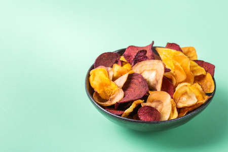 Dried vegetables, dehydrated sweet potato, parsnip, beetroot chips, snacksの写真素材