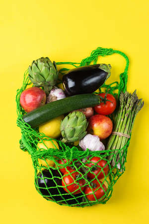 Mesh bag with fruits, vegetables. Zero waste, plastic free concept