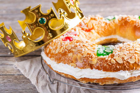 Traditional Spanish Epiphany cake, Roscon de Reyes with festive decorationsの写真素材