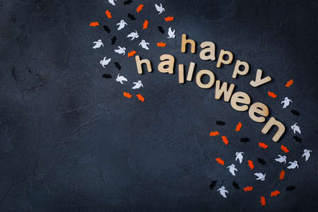 Halloween greeting card with ghosts, spiderweb, pumpkin and batsの写真素材
