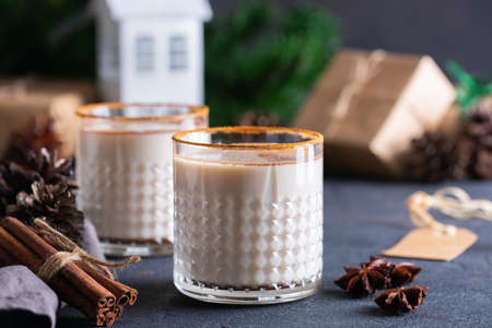 Traditional Christmas drink and dessert Eggnog with handmade gift boxesの写真素材