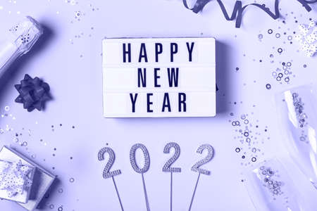 Happy New Year greeting card, 2022 with confetti and sparklesの写真素材