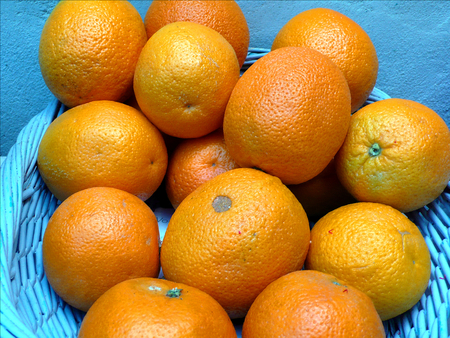 Orange basket on a table, interiorの写真素材