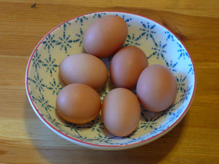 Eggs on a table, interiorの写真素材