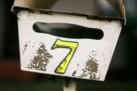Yellow number 7 on a letter boxの写真素材