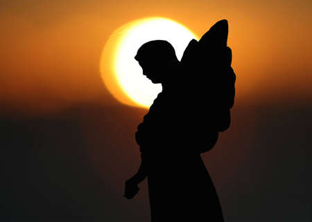 Silhouette of a Statue of an Angel の写真素材