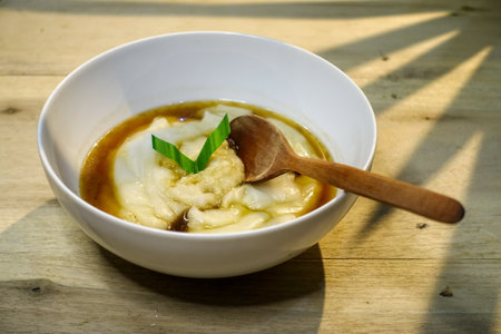 Thai dessert, steamed dumpling with coconut milk.