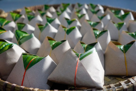 Desserts, made from glutinous rice, wrapped in paper.の写真素材