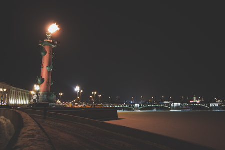 Rostral column in Saint - Petersburg with fireの写真素材