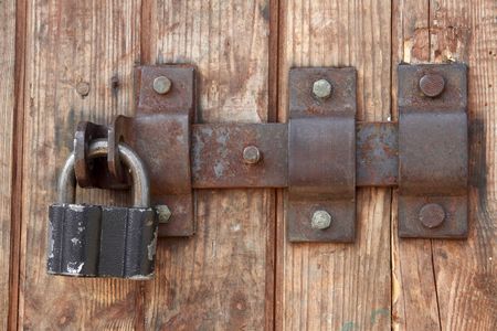 Old doors lock of wood barn                                の写真素材