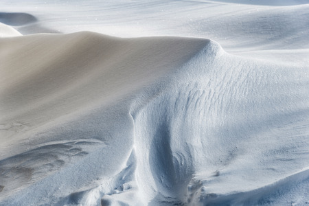 Snow drift on sunny dayの写真素材