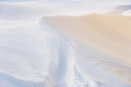 Snow drift on sunny dayの写真素材