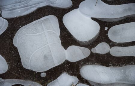 Drawing on ice puddles in late autumn