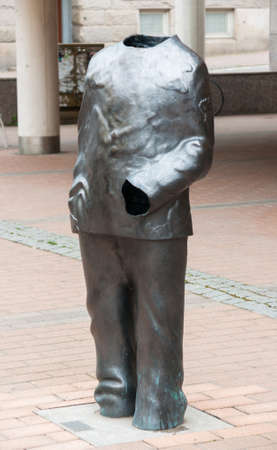 Tampere, Finland, August 11, 2014: Metal statue of clothes at store Seppala, - Pietilankatu street...