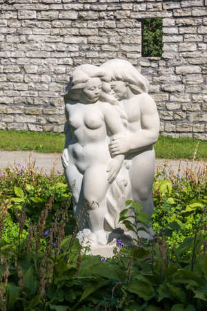 Tallinn, Estonia, August 16, 2014: sculpture "Adam and Eve" in white marble. Sculptor Ellen Kolk. Commandant's garden (Komandandi aed), Toompea, Tallinn's historic centerのeditorial素材