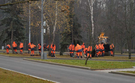 Moscow, Russia, November 02, 2021: Workers clean up in Victory Park in autumnのeditorial素材