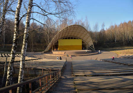 Moscow, Russia, October 31, 2021: Open air stage and benches for spectators in recreation park âTroparevoâ in autumnのeditorial素材