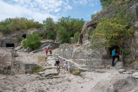 Chufut-Kale near Bakhchisarai, central Crimea, August 2, 2012: Ancient streets and caves of Chufut-Kale in Crimean Mountains, medieval city-fortress, national monument of Karaites, now in ruinsのeditorial素材